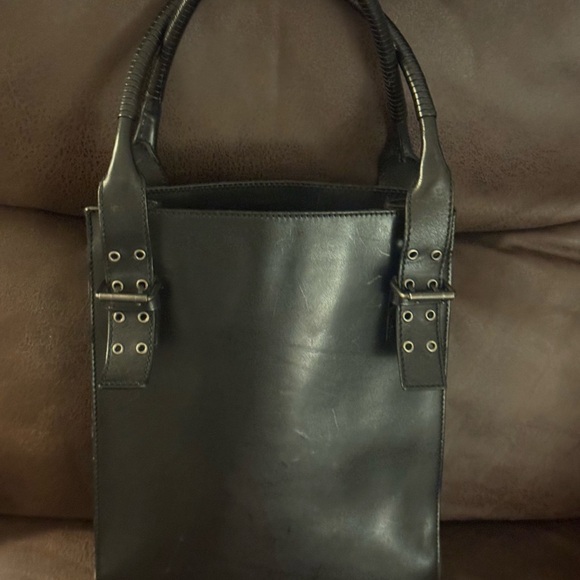 Authentic Yves Saint Laurent  Leather Grommet Detail Shoulder Handbag Black. - Picture 5 of 14